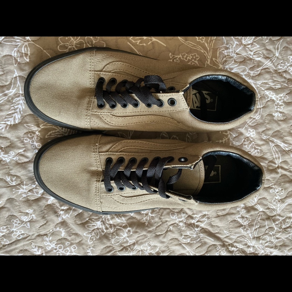 Taupe colored Vans with black sole + laces.
